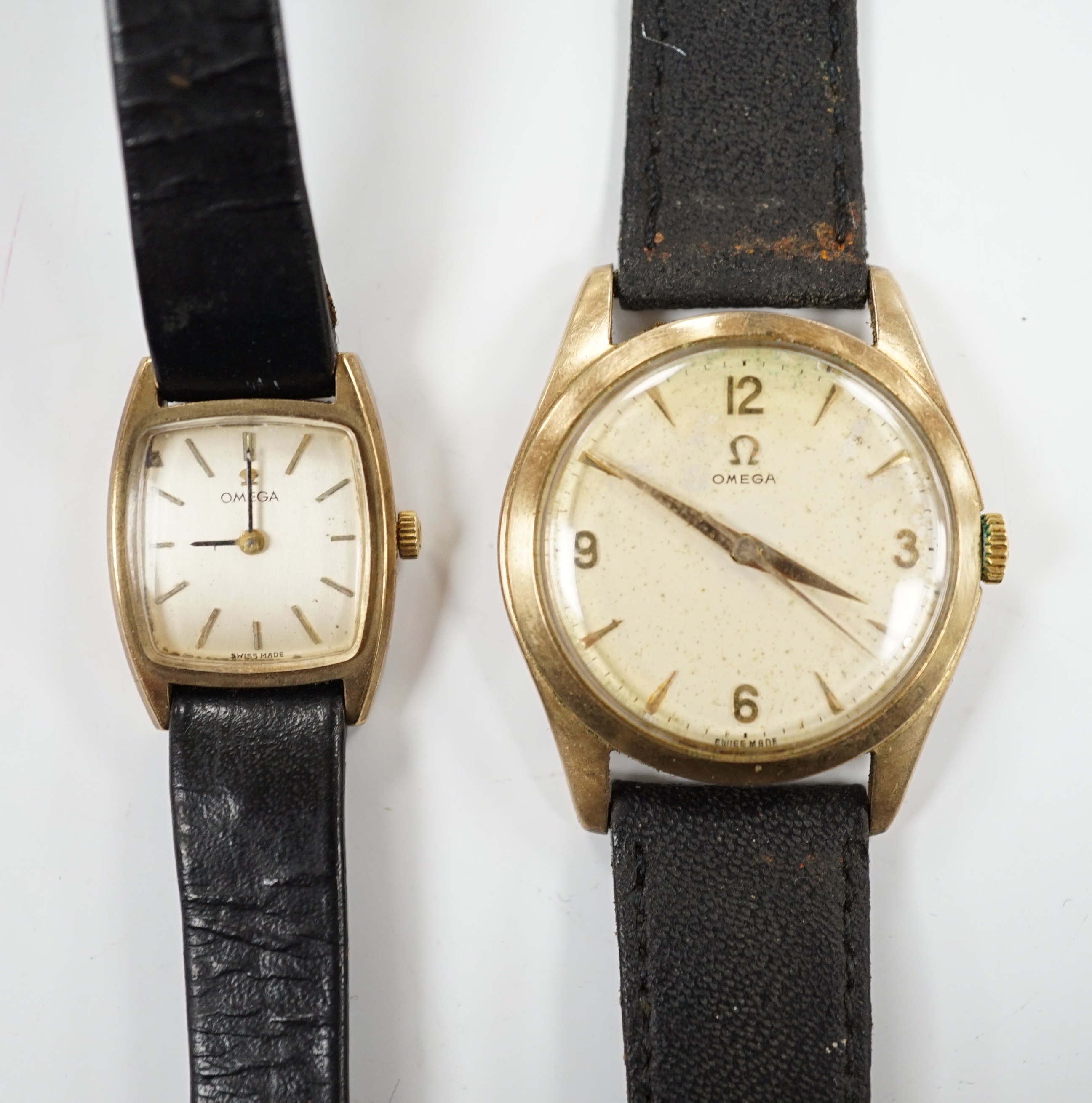 A gentleman's 9ct gold Omega manual wind wrist watch, on associated strap and a lady's 9ct gold Omega manual wind wrist watch.